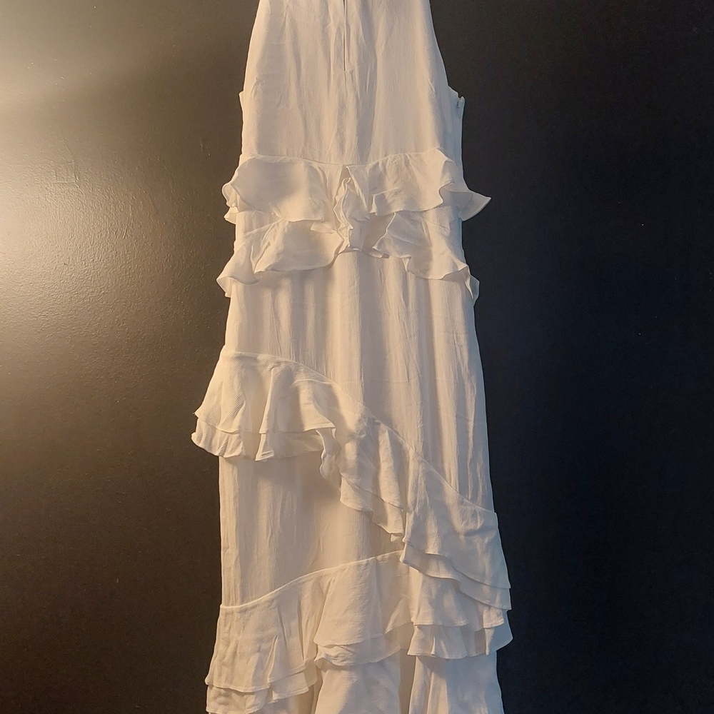 Absolutely beautiful White Ruffle Maxi Dress for a beautiful occasion.